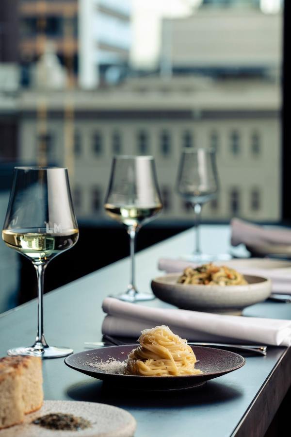 Next Hotel Melbourne, Curio Collection By Hilton Exterior photo Wine glasses