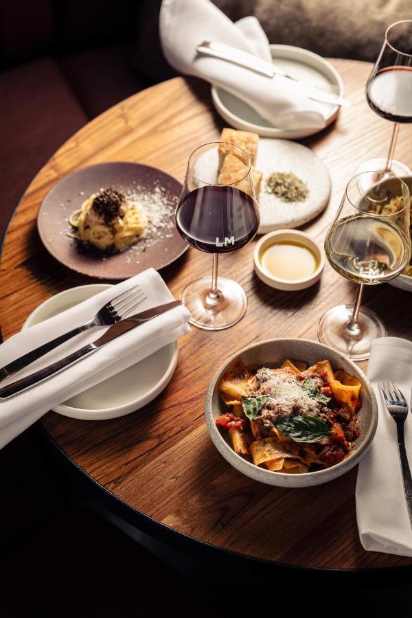 Next Hotel Melbourne, Curio Collection By Hilton Exterior photo A selection of dishes at the restaurant